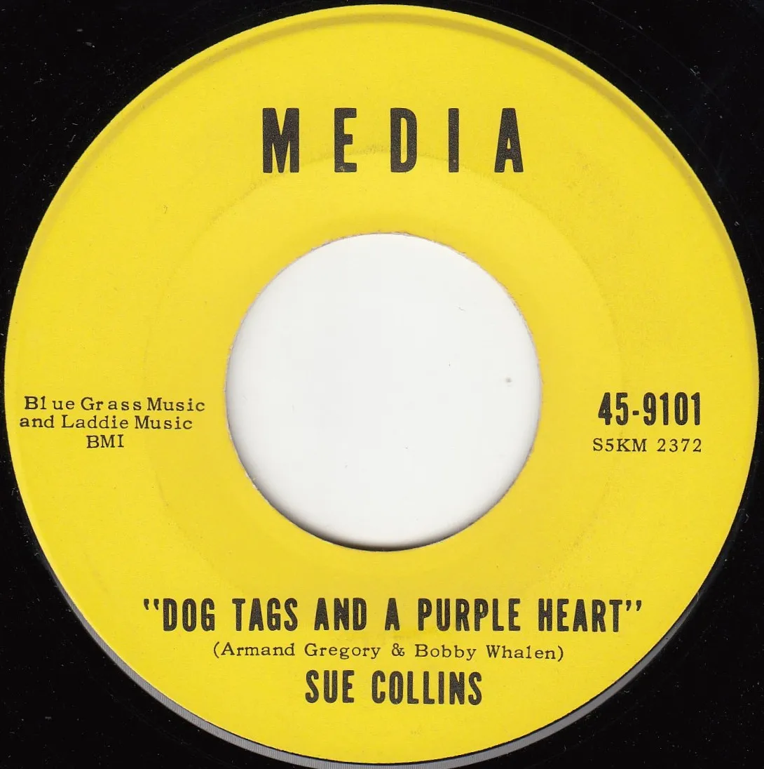 Dog Tags and a Purple Heart – Sue Collins (A-side label)