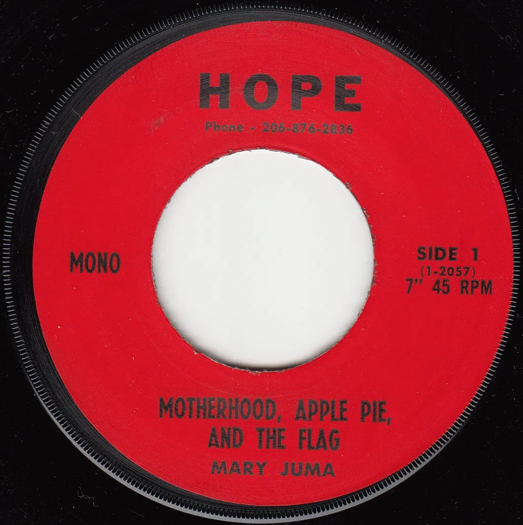 Motherhood, Apple Pie, and the Flag – Mary Juma (A-side label)